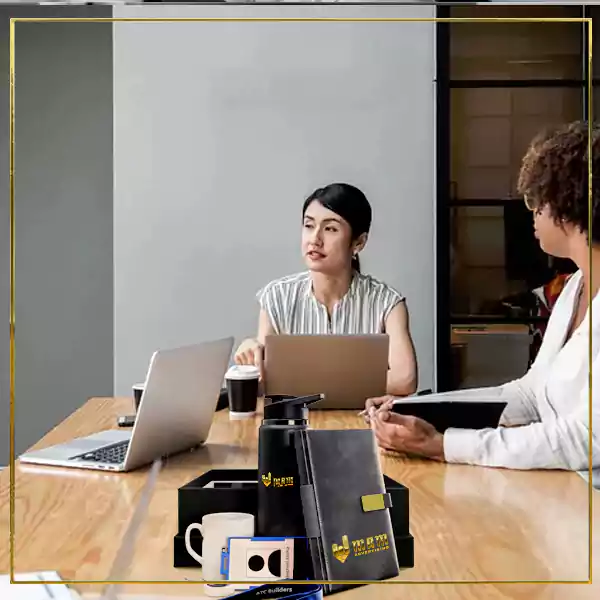 Professionals collaborating in office, framed by letter-shaped windows